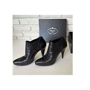 PRADA Sleek Black Leather Heeled Ankle Boots